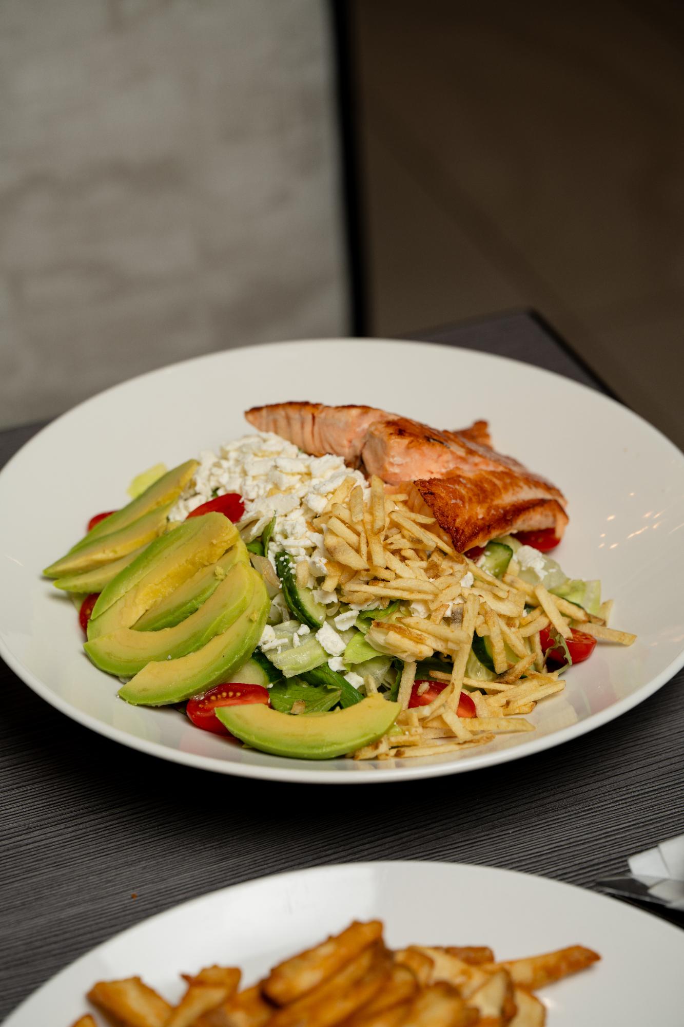 Fresh salmon avocado salad at Joe's Kitchen